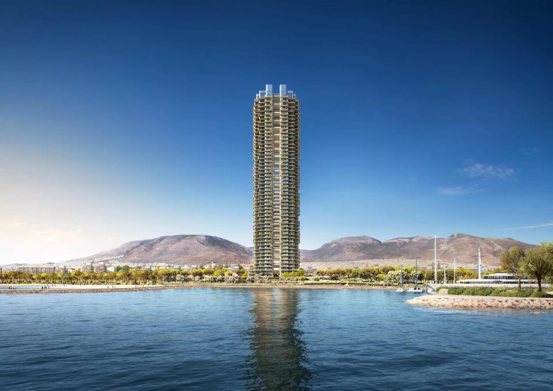 The Riviera Tower skyscraper A multi-story tower in front of the sea. Behind it, trees; to the right, a section of the marina with boats.