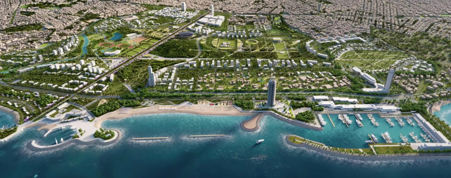 Seaside, the Riviera Tower, and to the right marinas. Behind, buildings and a park with a lake.