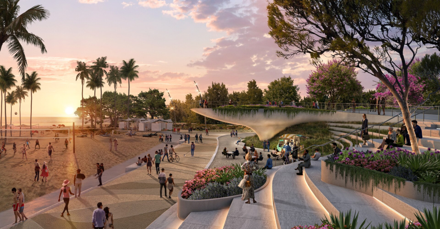 Άνθρωποι σε παραλιακό πεζόδρομο. Δεξιά φαρδιά σκαλοπάτια με ζαρντινιέρες. Αριστερά beach volley και φοίνικες.