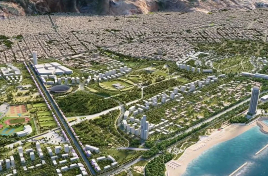 Εικονική αεροφωτογραφία με πάρκο, αθλητικές εγκαταστάσεις, κτίρια, παραθαλάσσιο ουρανοξύστη και μαρίνα.