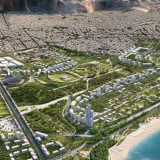 Εικονική αεροφωτογραφία με πάρκο, αθλητικές εγκαταστάσεις, κτίρια, παραθαλάσσιο ουρανοξύστη και μαρίνα.